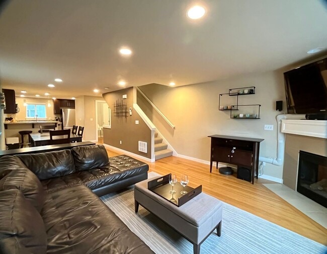 Building Photo - Stylish Greenwood Townhome with Private Patio & Modern Finishes