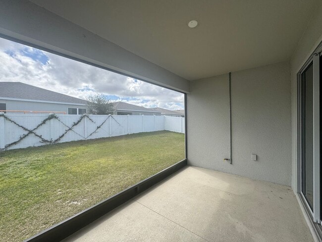 Building Photo - Where Modern Comfort Meets 4BD/3BA Hometown Charm — Your Story Begins in Okahumpka! FULLY-FENCED!...