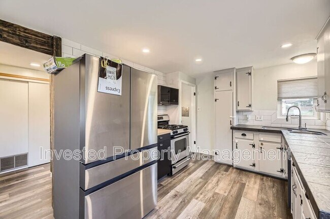 Building Photo - 8411 W 64th Pl