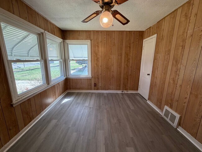 Building Photo - Bright Cape w/ Sunroom, Central Air, Big Basement & Backyard Shed