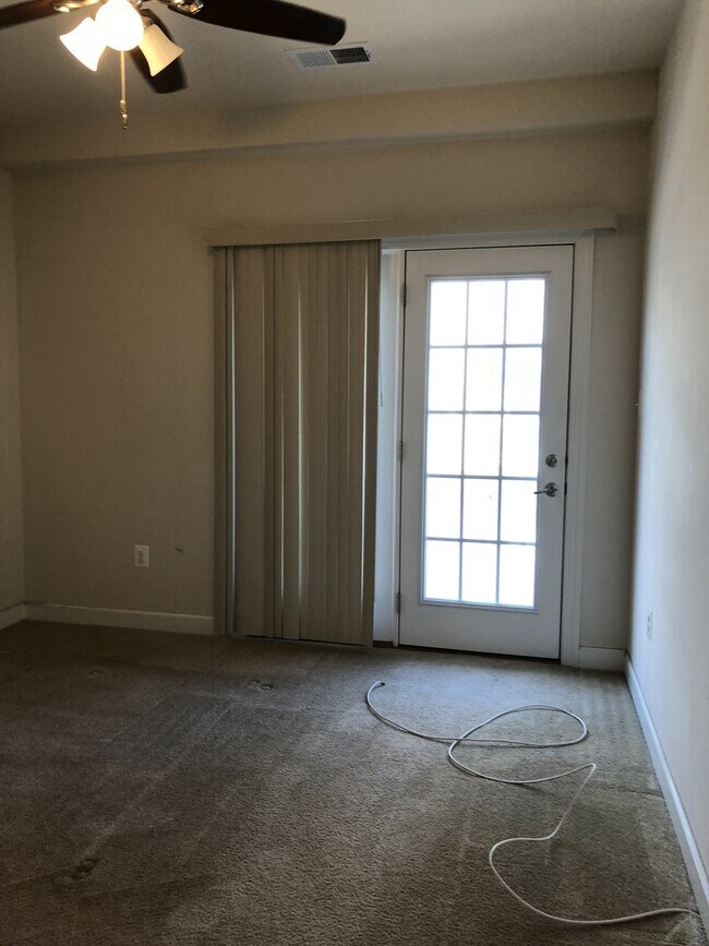 Building Photo - 2 Level Townhouse/condo with one car garage in the Watkins Mill Town Center