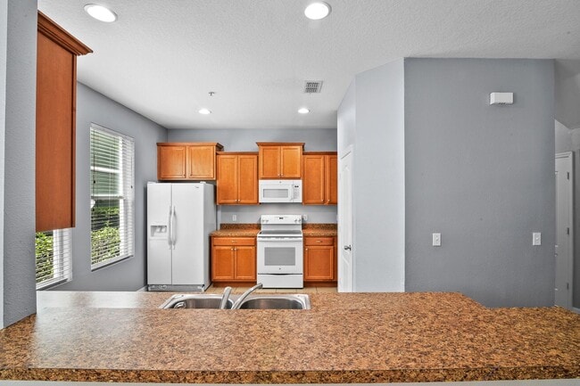 Building Photo - Amazing 3/2.5/2 Townhome in Lake Nona's Ea...