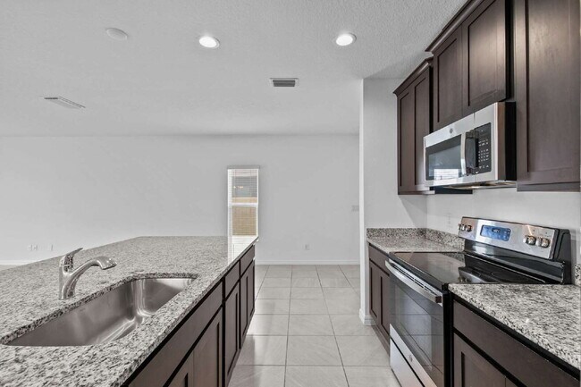 Building Photo - Spacious 4-Bedroom Home with Loft, Office & Private Backyard
