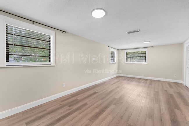 Building Photo - 6121 N Falkenburg Rd