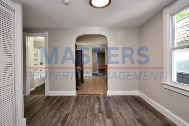 Building Photo - Three bedroom with 1 and a half bath tradi...