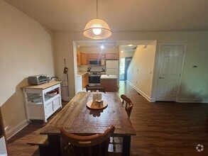 Building Photo - Spacious Furnished 3-Bedroom Condo – All U...