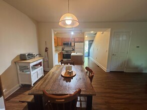 Building Photo - Spacious Furnished 3-Bedroom Condo – All U...