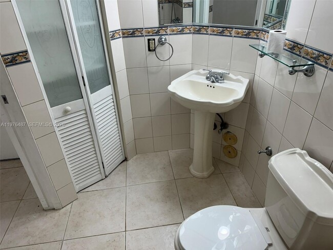 Building Photo - 10210 Collins Ave