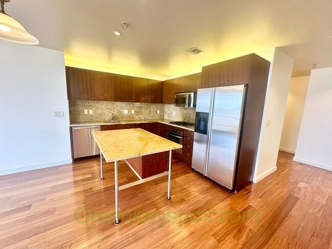 Building Photo - Spacious, open-concept 1-bedroom 16th floo...