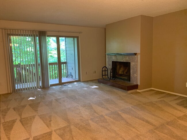 Peg Tree - Picturesque Living Area with Fireplace - Peg Tree Apartments