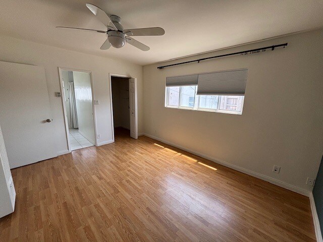 master bedroom with door to master bathand walk-in closet in view - 110 Brooks Ave