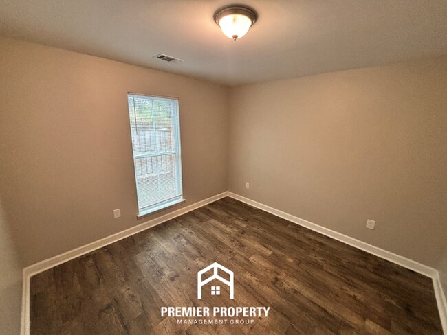 Building Photo - Charming 3BR Home with Vaulted Ceilings, Stainless Steel Kitchen & Fenced Yard in Odenville