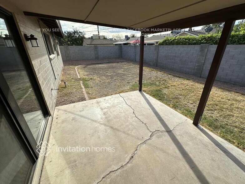 Building Photo - 8719 E Plaza Ave