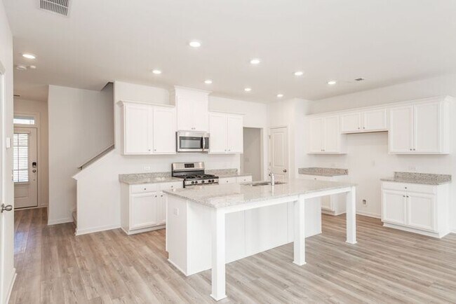 Building Photo - Beautifully designed 3-bedroom, 2.5-bath e...
