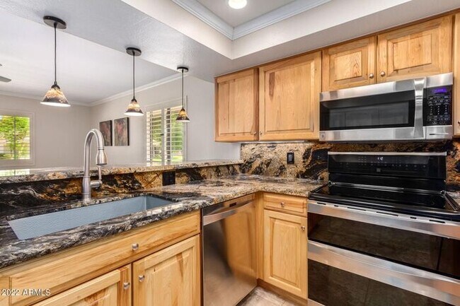 Building Photo - Your Oasis Awaits!