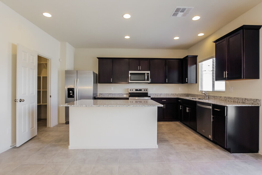 Building Photo - 24398 W Flores Dr