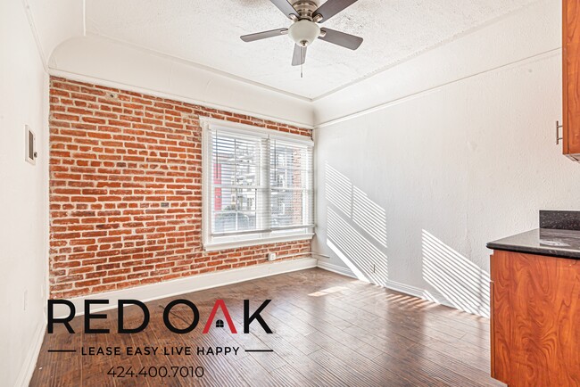 Primary Photo - Stylish Studio with Exposed Red Brick, Min...