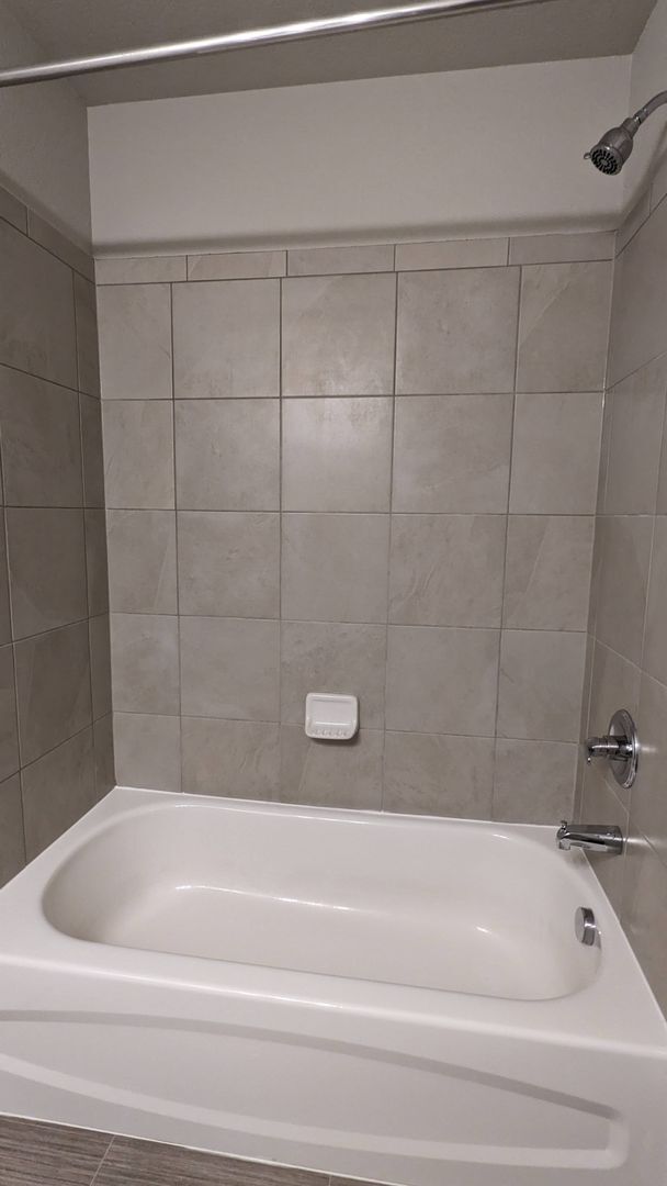 Building Photo - NEWER END UNIT TWO STORY TOWNHOME WITH A/C...