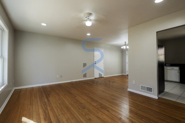 Building Photo - Move in before December 15th and choose your reward: a $250 Amazon Gift Card or a 55" Smart TV!