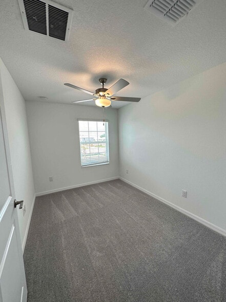 Building Photo - 32201 Powderpuff Mimosa Dr