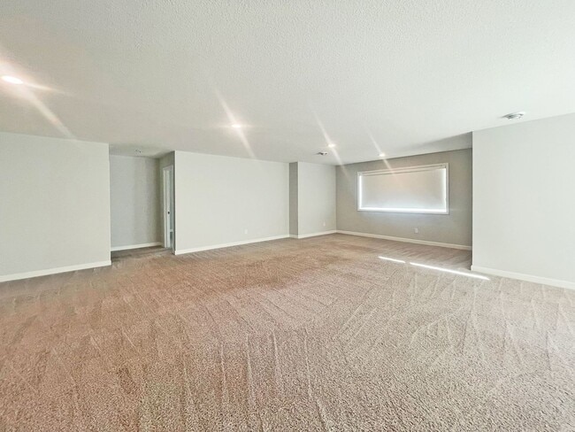 Building Photo - Sparkling Like-New 2-story w/ Full Walkout on Pond with Office-Bedroom 6, Pets OK!