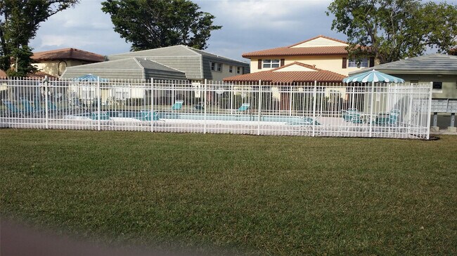 Building Photo - 8877 NW 28th Dr