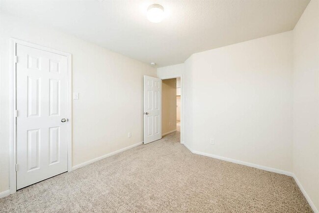 Building Photo - Beautiful stone front 4 bedroom, 3 bath home has bay windows in breakfast nook & master. It is on...
