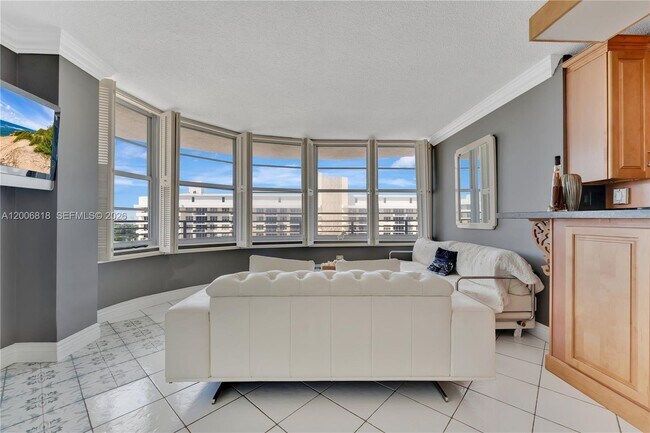 Building Photo - 5555 Collins Ave