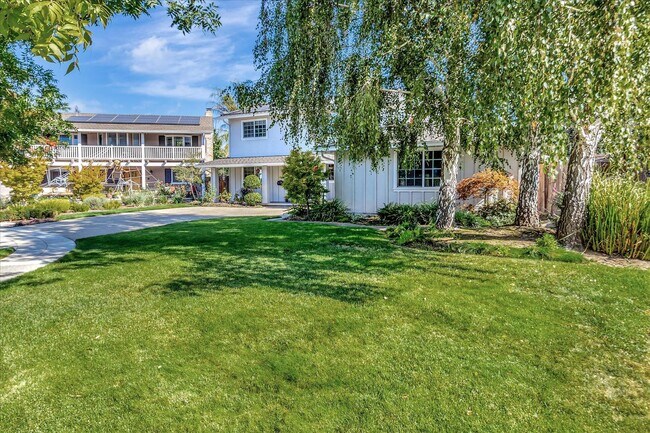 Building Photo - Executive Oasis l Huge Lot with Lush Green...