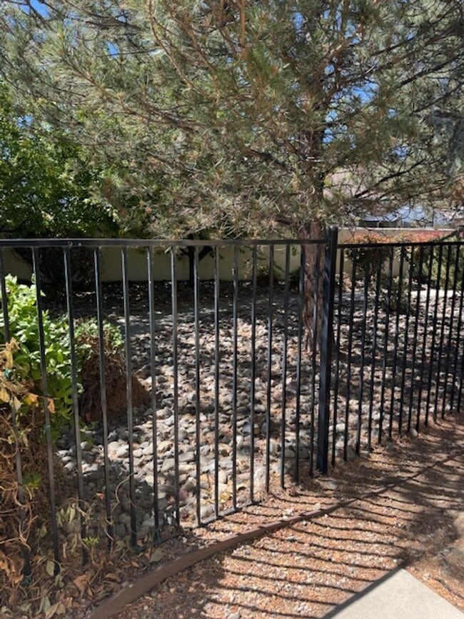 Building Photo - Located in a Quiet, Gated Community in Car...