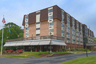 Building Photo - River Club Apartments 55+ Senior Community