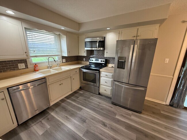 Building Photo - Home For Rent By Capital Property Management