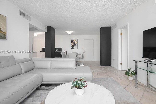 Building Photo - 5555 Collins Ave