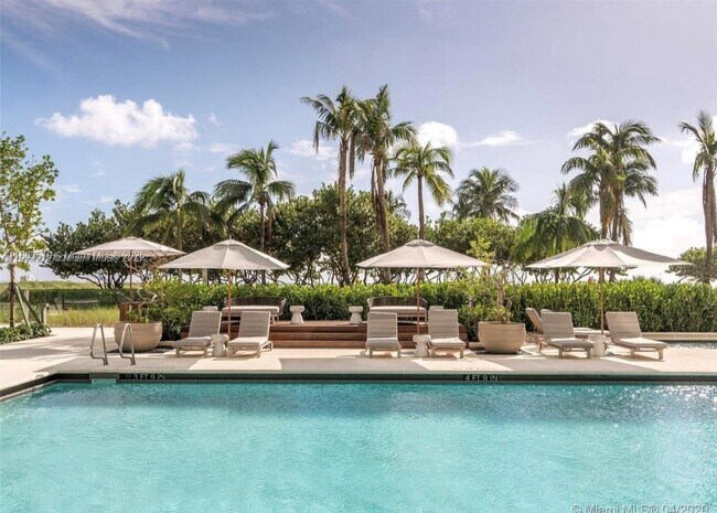Building Photo - 10203 Collins Ave