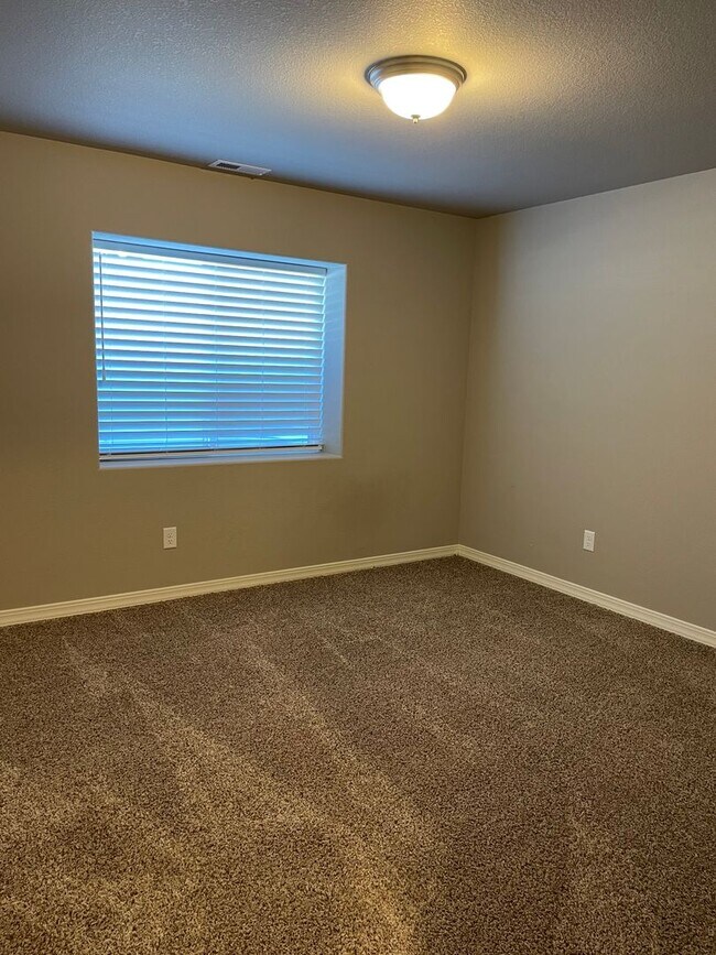 Building Photo - Ranch home on a corner lot with lawn care ...