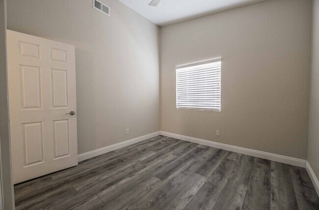 Building Photo - STUNNING 3 Bedroom Home with a 3 CAR GARAGE & RV PARKING!