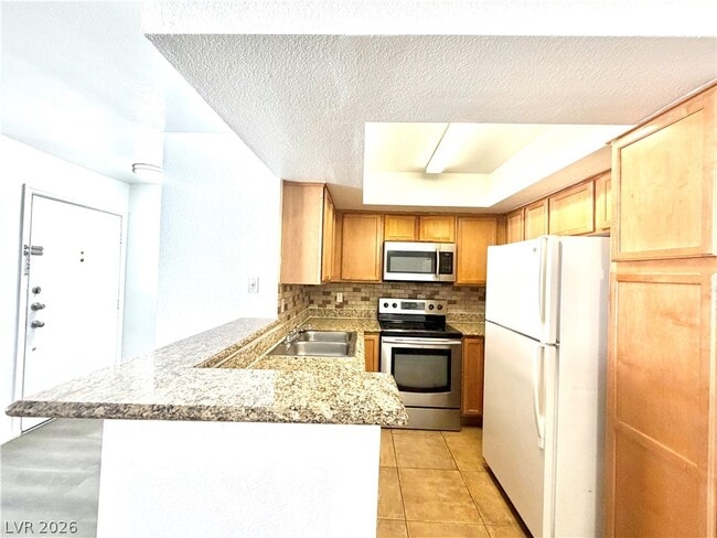 Building Photo - 1455 E Katie Ave