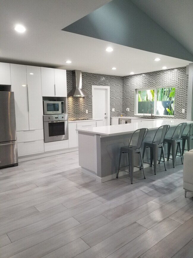 Kitchen with Stainless Appliances - 1715 NE 11th St