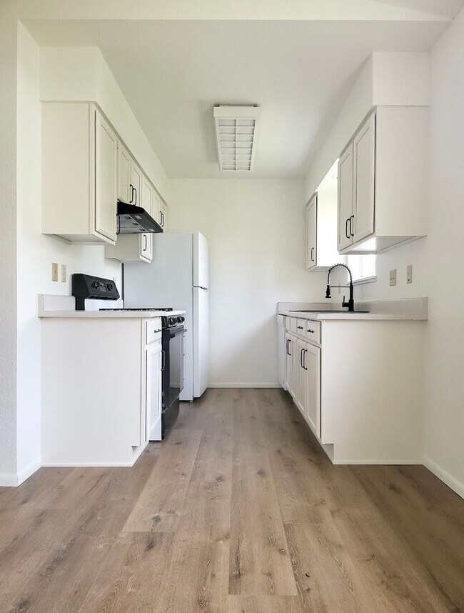 Building Photo - Newly Renovated Farmhouse style unit with new mini split for heating and cooling and garage