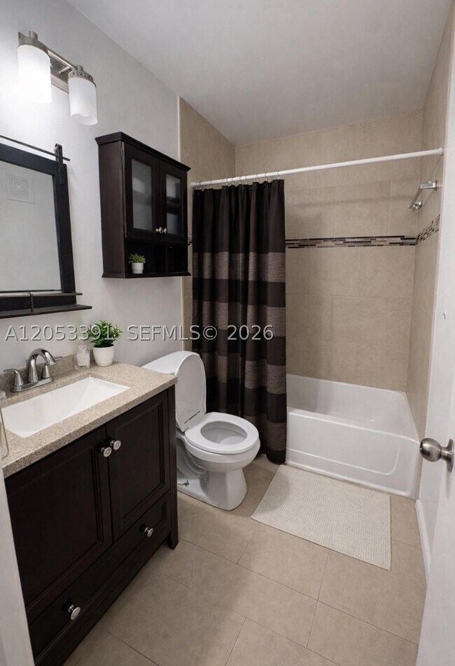 Building Photo - 9821 W Elm Ln
