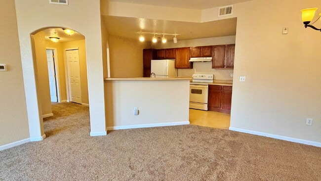 Building Photo - NEW CARPET NEW PAINT!! Clean and Bright 2BR 2BTH Condo Close To DIA. Gated Community in First Cre...