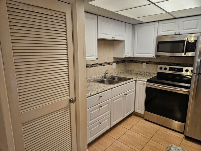 Building Photo - First Floor Condo in 55+ Community in Dunedin FL