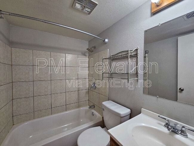 Building Photo - 9430 E Girard Ave