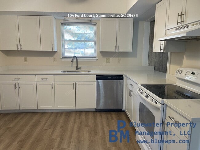 Building Photo - Remodeled Home - New LVP Flooring, Paint, Kitchen Cabinets and Countertop