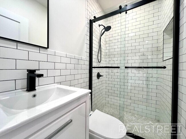 Building Photo - BRAND NEW 4 BED 2 BATH WITH W/D IN UNIT!