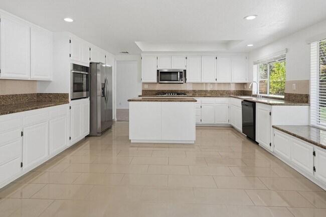 Building Photo - SPACIOUS 4 BEDROOM, 3 BATH HOME WITH 3-CAR GARAGE!