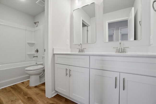 Building Photo - 4BR Home in The Pines at Paw Creek – New Construction + Private Deck