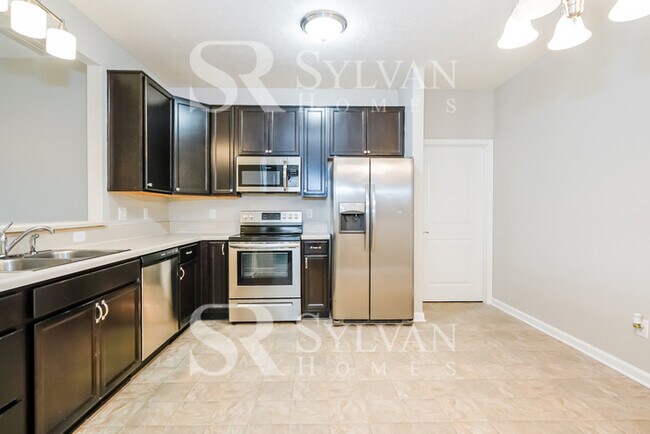 Building Photo - Turn the key. Enter. Smile. Repeat every day!