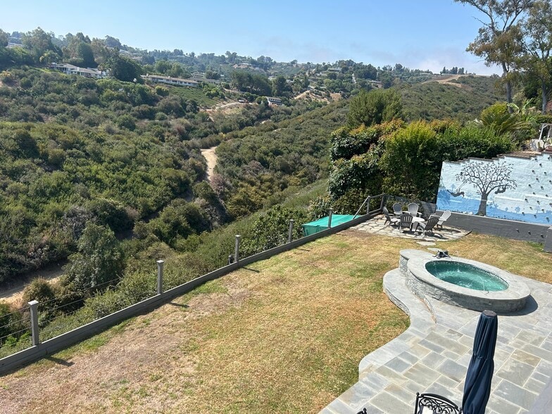 Aerial view of backyard with fire pit, Jacuzzi and view of Rolling Hills - 27078 Sunnyridge Rd