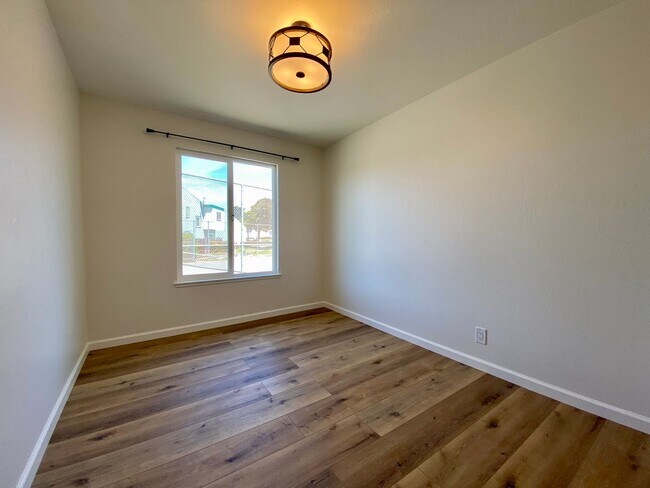 Building Photo - Remodeled 3BR, 2BA with Orchard, Garage & ...